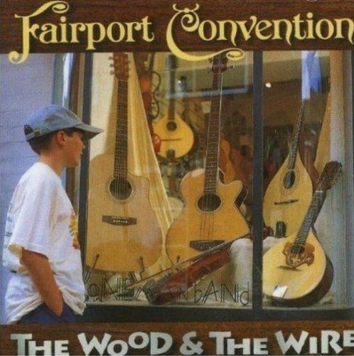 "Album cover featuring a boy looking at guitars in a shop window display."