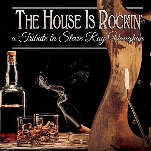 Album cover with whiskey glasses, bottle, and broken guitar against a black background.