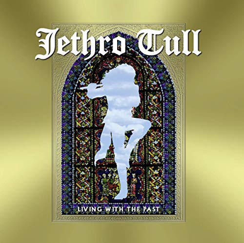 "CD cover with stained glass window and silhouette against a gold background."
