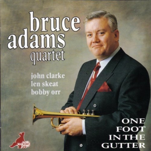 "CD cover featuring a man in a suit holding a trumpet."