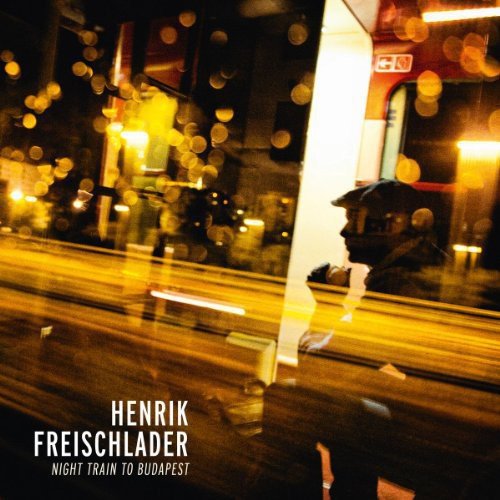 Blurry album cover featuring a man on a train at night.