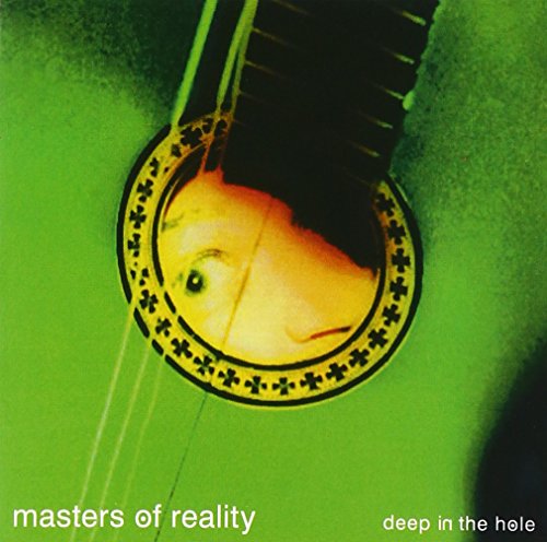 "Album cover with a face visible through a guitar sound hole, green background."