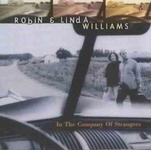 "CD cover featuring a black and white photo of a man and woman."