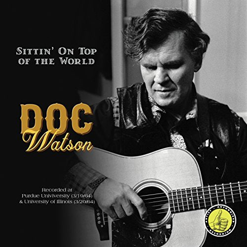 "Album cover featuring a black and white photo of Doc Watson playing guitar."