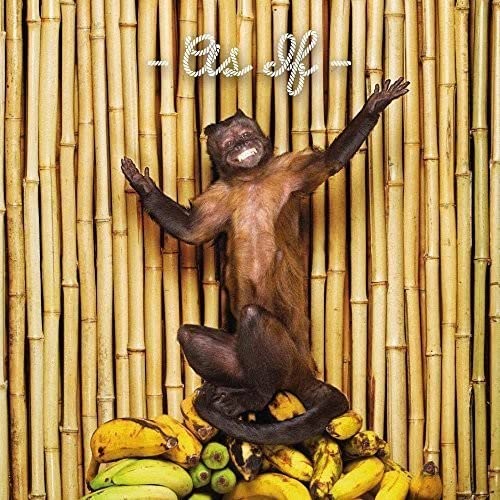 CD cover: monkey with outstretched arms against a bamboo background.