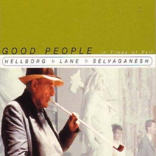 Album cover with man in hat smoking pipe, faded background figures.