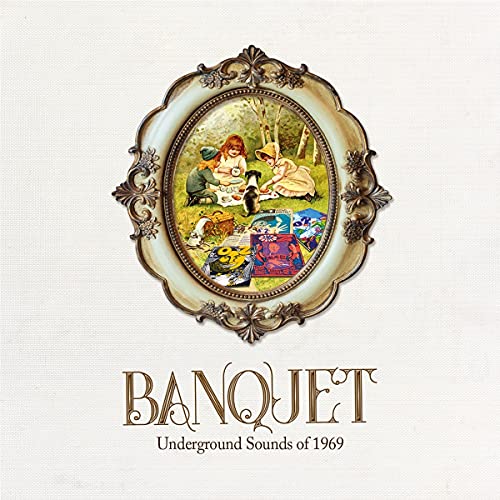 CD cover: ornate frame with children, a cat, and picnic items.