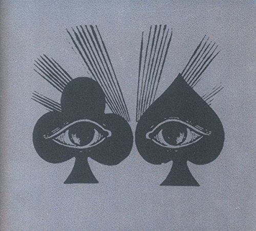 CD cover with two black spade cards featuring stylized eyes.