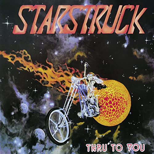 CD cover: motorcycle riding through space toward a golden planet.
