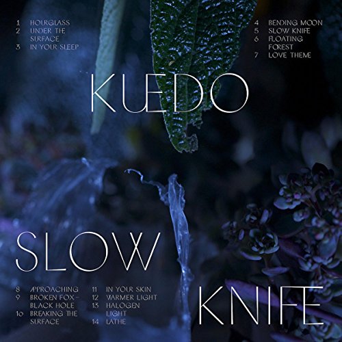 CD cover for Kuedo’s “Slow Knife” featuring blurred green foliage.