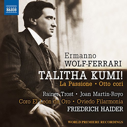 "CD cover with a black-and-white photo of a man in a suit."