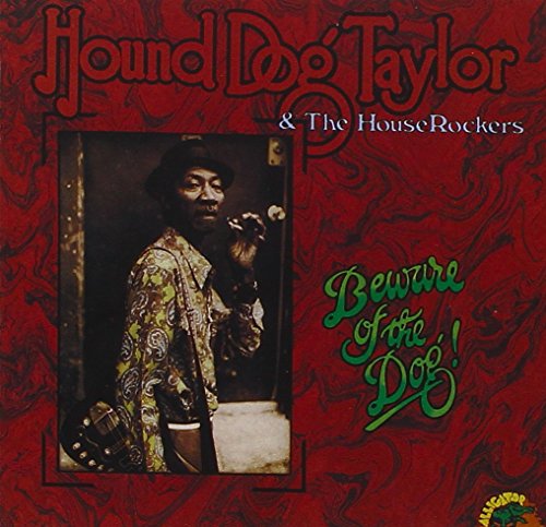 Red vinyl album cover with Hound Dog Taylor holding a guitar, marbled background.