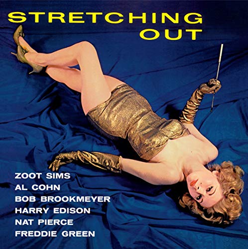 CD cover: woman in gold outfit reclining on blue fabric.