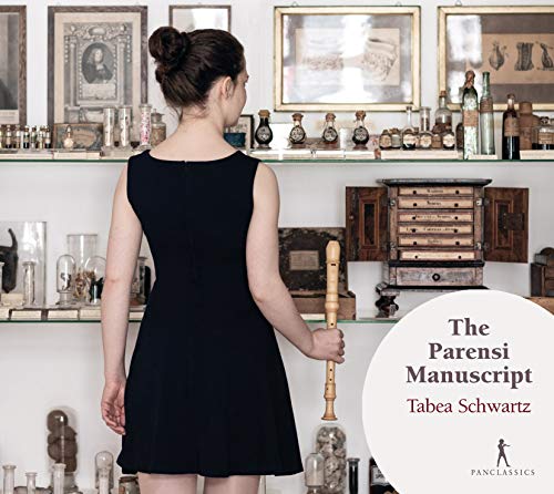 Woman in black dress holding a candle, surrounded by antique medical artifacts on shelves.