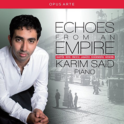 CD album cover featuring a man and a city street scene.