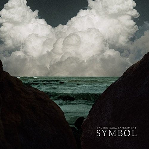 "Bluray cover with a rocky shoreline and turbulent sea beneath large, cloudy sky."