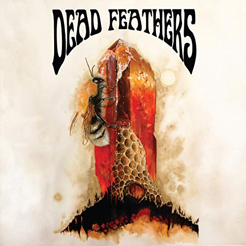 Album cover: insect-like figure before a large, glowing crystal formation.