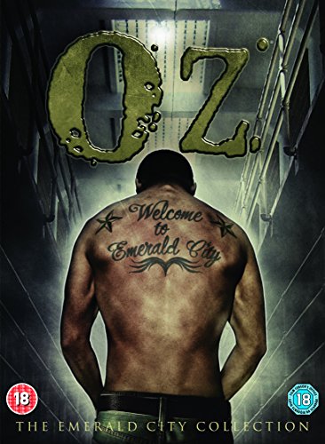 “Oz” DVD cover featuring a man’s back with tattoos, green title text.