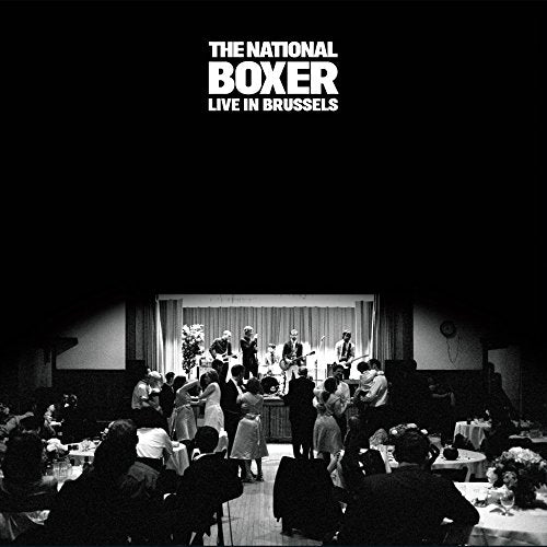 Black and white album cover of The National performing live in Brussels.