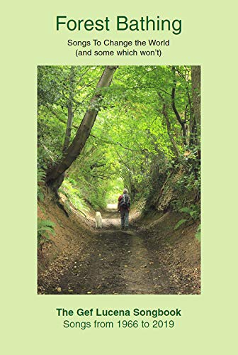 Album cover: a person and dog walk down a path through lush green trees.