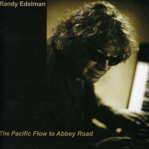 Album cover featuring Randy Edelman at a piano, with title and artist name.