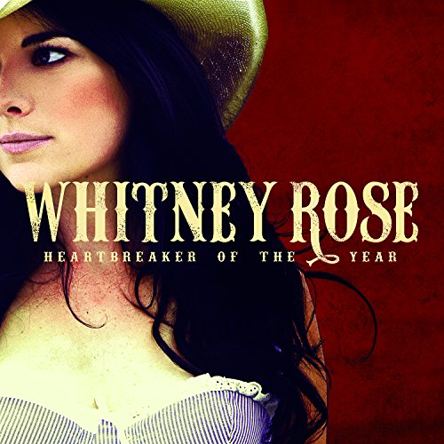 "CD cover featuring a woman in a hat with 'Whitney Rose' and 'Heartbreaker of the Year' text."