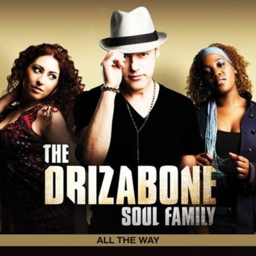 "CD cover with three people and 'The Drizabone Soul Family' text."