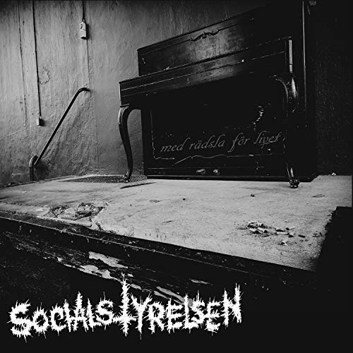 Black and white vinyl album cover featuring a damaged piano and text.