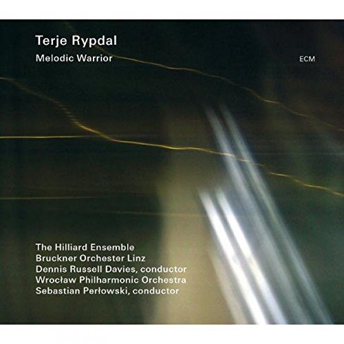 "CD cover with dark background, white and yellow streaks, and white text."