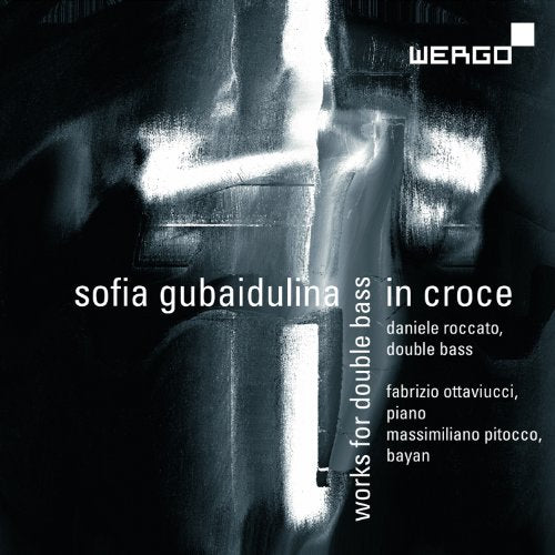 A CD cover with a black and white cross on a dark background.