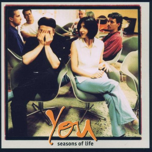 CD cover with group of people seated in chairs, text “You”.