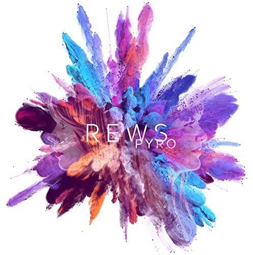 The image depicts a vibrant splash of paint in shades of blue, purple, and orange. Alt text: "Colorful paint splash with 'Rews Pyro' text in the center."