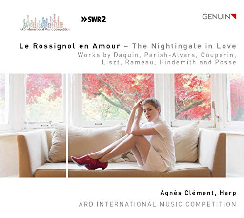 CD cover: Woman on sofa with autumn trees visible through windows.