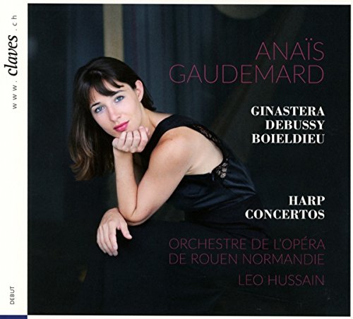 CD cover with a woman in a black dress against a dark background.