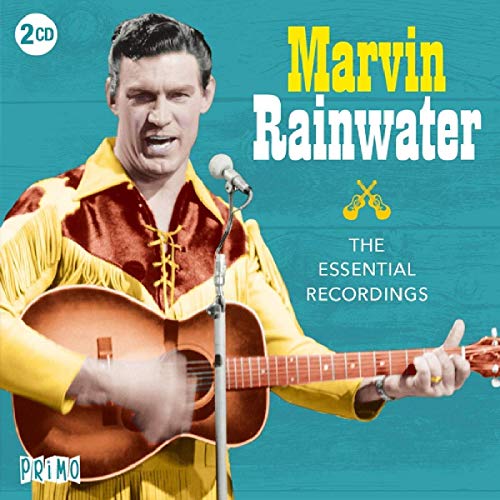 "CD cover featuring Marvin Rainwater playing guitar, wearing a yellow fringed shirt."