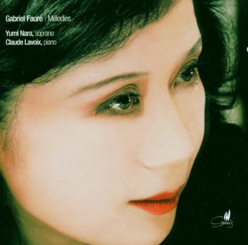 CD cover featuring a close-up of a woman's face with dark hair and red lips.