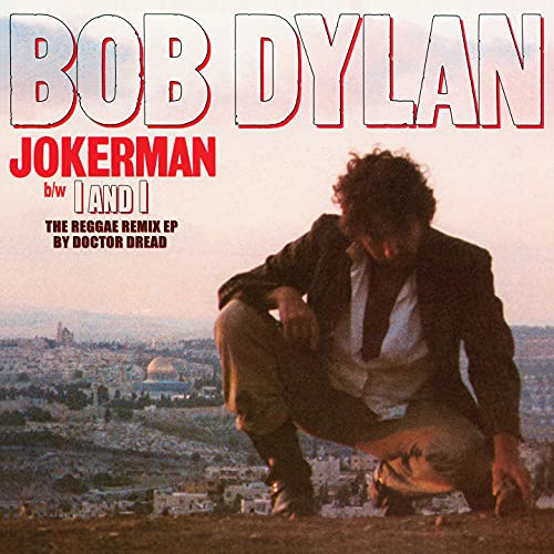 Bob Dylan album cover, "Jokerman / I And I Remixes", with city backdrop.
