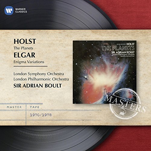 "CD cover with a beige label, vinyl records, and a galaxy image."