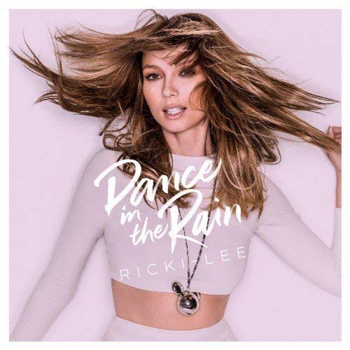 Ricki-lee album cover, woman with windswept hair and text overlay.