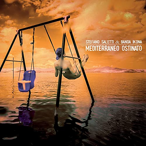 CD cover: two swings over water at sunset, person swinging.
