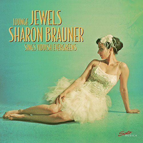 Album cover: Sharon Brauner in a white dress against a green gradient.