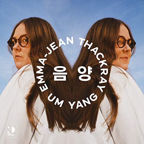The alt text for the image is: "Album cover with mirrored image of a woman with long brown hair."