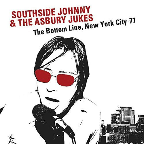 CD cover: black and white portrait of a singer with red sunglasses.