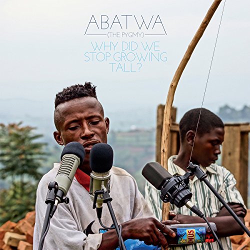 Album cover featuring a young man speaking into a microphone outdoors.