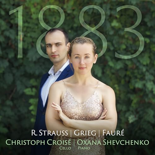 CD cover featuring two musicians against a leafy green background.
