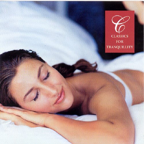 Woman sleeping peacefully on white bedding, CD cover with red text.