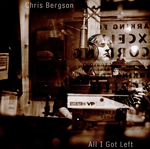 CD cover: Chris Bergson singing into a vintage microphone.