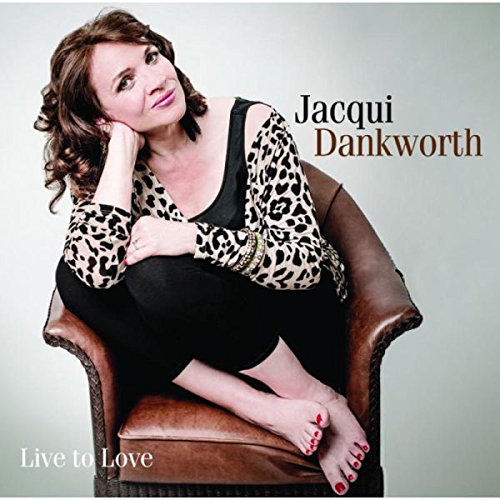 Jacqui Dankworth album cover: woman in leopard print top sitting on a leather chair.