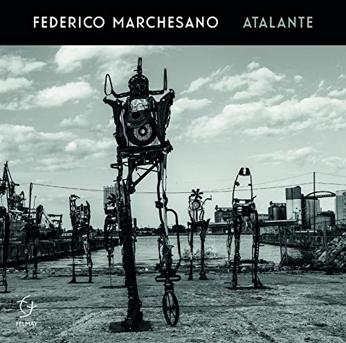 "Music CD cover featuring a black-and-white image of metal sculptures."