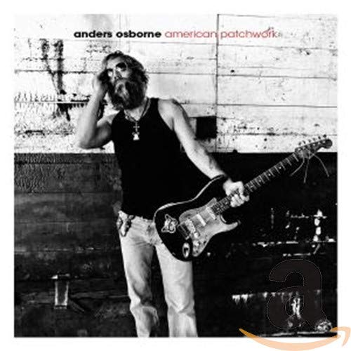 Black and white CD cover featuring a man with a guitar.